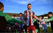 26 April 2024; Adam Foley of Drogheda United greets supporters before the SSE Airtricity Men's Premier Division match between Drogheda United and Sligo Rovers at Weavers Park in Drogheda, Louth. Photo by Shauna Clinton/Sportsfile