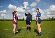 27 April 2024; Referee tosses the rules dice before the game between Kilshannig LGFA club in Cork and Ardfinnan LGFA club in Tipperary during the 2024 ZuCar Gaelic4Teens Festival Day at Faithful Fields Offaly GAA Centre of Excellence in Kilcormac, Offaly. Photo by Brendan Moran/Sportsfile