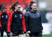 27 April 2024; Bohemians players Sarah McKevitt, left, and Rachel Kelly inspect the pitch before the SSE Airtricity Women's Premier Division match between Bohemians and Treaty United at Dalymount Park in Dublin. Photo by Shauna Clinton/Sportsfile