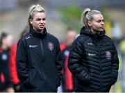 27 April 2024; Bohemians players Ciara Smith, left, and Lynn Craven inspect the pitch before the SSE Airtricity Women's Premier Division match between Bohemians and Treaty United at Dalymount Park in Dublin. Photo by Shauna Clinton/Sportsfile