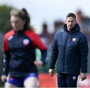27 April 2024; Treaty United manager Dominic Foley looks on as players warm-up before the SSE Airtricity Women's Premier Division match between Bohemians and Treaty United at Dalymount Park in Dublin. Photo by Shauna Clinton/Sportsfile
