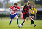 27 April 2024; Jack Cregan of Treaty United in action against Alfie O'Hanlon of Bohemians during the EA SPORTS LOI Academy MU15 development weekend at FAI Headquarters in Abbotstown, Dublin. Photo by Seb Daly/Sportsfile
