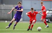 27 April 2024; Cillian O'Sullivan of Shelbourne, right, in action against Darragh Mallon of Wexford during the EA SPORTS LOI Academy MU15 development weekend at FAI Headquarters in Abbotstown, Dublin. Photo by Seb Daly/Sportsfile