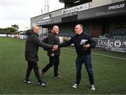 26 April 2024; Dundalk manager Noel King, in the company of head of media and communications Gavin McLaughlin, shakes hands with Adrian Taaffe of LOI TV  before the SSE Airtricity Men's Premier Division match between Dundalk and Bohemians at Oriel Park in Dundalk, Louth. Photo by Stephen McCarthy/Sportsfile
