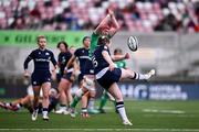 27 April 2024; Meryl Smith of Scotland has a kick chased dow by Aoife Wafer of Ireland during the Women's Six Nations Rugby Championship match between Ireland and Scotland at the Kingspan Stadium in Belfast. Photo by Ben McShane/Sportsfile