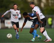 26 April 2024; James Akintunde of Bohemians is tackled by Andy Boyle of Dundalk during the SSE Airtricity Men's Premier Division match between Dundalk and Bohemians at Oriel Park in Dundalk, Louth. Photo by Stephen McCarthy/Sportsfile