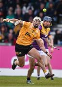 27 April 2024; Seaan Elliott of Antrim in action against Shane Reck of Wexford during the Leinster GAA Hurling Senior Championship Round 2 match between Antrim and Wexford at Corrigan Park in Belfast. Photo by Sam Barnes/Sportsfile
