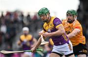 27 April 2024; Matthew O'Hanlon of Wexford in action against Conor McCann of Antrim during the Leinster GAA Hurling Senior Championship Round 2 match between Antrim and Wexford at Corrigan Park in Belfast. Photo by Sam Barnes/Sportsfile