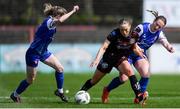 27 April 2024; Fiona Donnelly of Bohemians in action against Delana Friesen, right, and Cara Griffin of Treaty United during the SSE Airtricity Women's Premier Division match between Bohemians and Treaty United at Dalymount Park in Dublin. Photo by Shauna Clinton/Sportsfile