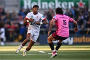 26 April 2024; Rob Baloucoune of Ulster and Jacob Umaga of Benetton during the United Rugby Championship match between Ulster and Benetton at Kingspan Stadium in Belfast. Photo by Ben McShane/Sportsfile