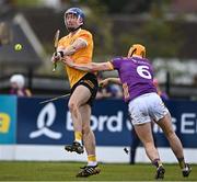 27 April 2024; James McNaughton of Antrim is fouled by Damien Reck of Wexford during the Leinster GAA Hurling Senior Championship Round 2 match between Antrim and Wexford at Corrigan Park in Belfast. Photo by Sam Barnes/Sportsfile