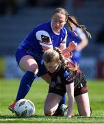 27 April 2024; Orlagh Fitzpatrick of Bohemians in action against Delana Friesen of Treaty United during the SSE Airtricity Women's Premier Division match between Bohemians and Treaty United at Dalymount Park in Dublin. Photo by Shauna Clinton/Sportsfile