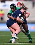 27 April 2024; Lana Skeldon of Scotland is tackled by Linda Djougang of Ireland during the Women's Six Nations Rugby Championship match between Ireland and Scotland at the Kingspan Stadium in Belfast. Photo by Ben McShane/Sportsfile