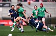 27 April 2024; Béibhinn Parsons of Ireland evades the tackle of Meryl Smith of Scotland during the Women's Six Nations Rugby Championship match between Ireland and Scotland at the Kingspan Stadium in Belfast. Photo by Ben McShane/Sportsfile