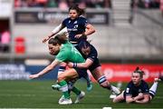 27 April 2024; Béibhinn Parsons of Ireland is tackled by Evie Gallagher of Scotland during the Women's Six Nations Rugby Championship match between Ireland and Scotland at the Kingspan Stadium in Belfast. Photo by Ben McShane/Sportsfile