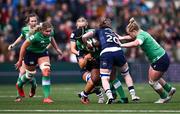 27 April 2024; Linda Djougang of Ireland is tackled by Rachel Malcolm, left, and Rachel McLachlan of Scotland during the Women's Six Nations Rugby Championship match between Ireland and Scotland at the Kingspan Stadium in Belfast. Photo by Ben McShane/Sportsfile