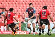 27 April 2024; Seán O'Brien of Munster looks for support during the United Rugby Championship match between Emirates Lions and Munster at Emirates Airline Park in Johannesburg, South Africa. Photo by Shaun Roy/Sportsfile