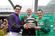 27 April 2024; Trainer Willie Mullins, centre, alongside jockeys Danny Mullins, left, and Paul Townend, with his trophy after winning the British Jump Trainers' Championship 2023/24 and becoming the first Irish based champion to achieve it in 70 years at Sandown Park in Surrey, England. Photo by Steven Cargill/Sportsfile