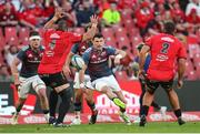 27 April 2024; Calvin Nash of Munster kicks ahead during the United Rugby Championship match between Emirates Lions and Munster at Emirates Airline Park in Johannesburg, South Africa. Photo by Shaun Roy/Sportsfile