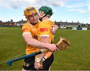 27 April 2024; Conor Boyd of Antrim, left, celebrates with team-mate Conal Cunning after their side's victory in the Leinster GAA Hurling Senior Championship Round 2 match between Antrim and Wexford at Corrigan Park in Belfast. Photo by Sam Barnes/Sportsfile