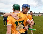 27 April 2024; James McNaughton of Antrim, right, celebrates with team-mate Conal Cunning after their side's victory in the Leinster GAA Hurling Senior Championship Round 2 match between Antrim and Wexford at Corrigan Park in Belfast. Photo by Sam Barnes/Sportsfile