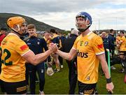 27 April 2024; James McNaughton of Antrim, right, celebrates with team-mate Michael Bradley after their side's victory in the Leinster GAA Hurling Senior Championship Round 2 match between Antrim and Wexford at Corrigan Park in Belfast. Photo by Sam Barnes/Sportsfile
