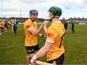 27 April 2024; James McNaughton of Antrim, left, celebrates with team-mate Conal Cunning after their side's victory in the Leinster GAA Hurling Senior Championship Round 2 match between Antrim and Wexford at Corrigan Park in Belfast. Photo by Sam Barnes/Sportsfile