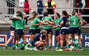 27 April 2024; Ireland players celebrate at the final whistle of the Women's Six Nations Rugby Championship match between Ireland and Scotland at the Kingspan Stadium in Belfast. Photo by Ben McShane/Sportsfile