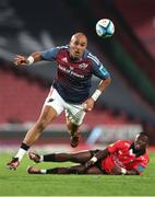 27 April 2024; Simon Zebo of Munster chases after the loose ball during the United Rugby Championship match between Emirates Lions and Munster at Emirates Airline Park in Johannesburg, South Africa. Photo by Shaun Roy/Sportsfile