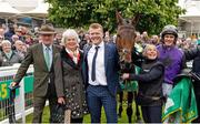 27 April 2024; Trainer Willie Mullins, left, with his wife Jackie and winning connections, celebrate with jockey Danny Mullins and Minella Cocooner after victory in the Gold Cup Handicap Chase at Sandown Park in Surrey, England. Photo by Steven Cargill/Sportsfile