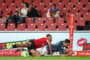 27 April 2024; Shane Daly of Munster dives over to score a try during the United Rugby Championship match between Emirates Lions and Munster at Emirates Airline Park in Johannesburg, South Africa. Photo by Shaun Roy/Sportsfile
