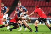 27 April 2024; RG Snyman of Munster is tacklesd by Ruan Dreyer of Emirates Lions during the United Rugby Championship match between Emirates Lions and Munster at Emirates Airline Park in Johannesburg, South Africa. Photo by Shaun Roy/Sportsfile