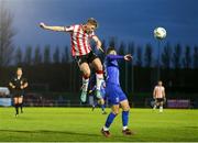 26 April 2024; Ronan Boyce of Derry City in action against Pádraig Amond of Waterford during the SSE Airtricity Men's Premier Division match between Waterford and Derry City at Regional Sports Centre in Waterford. Photo by Michael P Ryan/Sportsfile