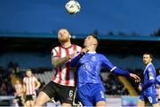 26 April 2024; Mark Connolly of Derry City in action against Pádraig Amond of Waterford during the SSE Airtricity Men's Premier Division match between Waterford and Derry City at Regional Sports Centre in Waterford. Photo by Michael P Ryan/Sportsfile