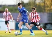 26 April 2024; Harvey Macadam of Waterford in action against Adam O’Reilly of Derry City during the SSE Airtricity Men's Premier Division match between Waterford and Derry City at Regional Sports Centre in Waterford. Photo by Michael P Ryan/Sportsfile