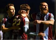 26 April 2024; Aaron McNally of Drogheda United, centre, celebrates with team-mates Darragh Markey, left, and Gary Deegan after scoring his side's third goal during the SSE Airtricity Men's Premier Division match between Drogheda United and Sligo Rovers at Weavers Park in Drogheda, Louth. Photo by Shauna Clinton/Sportsfile
