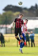27 April 2024; Rhys Cullen of Bohemians in action against Dylan Browne of Treaty United during the EA SPORTS LOI Academy MU15 development weekend at FAI Headquarters in Abbotstown, Dublin. Photo by Seb Daly/Sportsfile