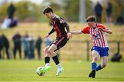 27 April 2024; Ashley Okeowo of Bohemians in action against Cian Dempsey of Treaty United during the EA SPORTS LOI Academy MU15 development weekend at FAI Headquarters in Abbotstown, Dublin. Photo by Seb Daly/Sportsfile