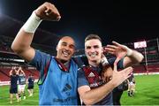 27 April 2024; Simon Zebo and Shane Daly of Munster celebrate after Munster beat Emirates Lions 13-33 in the United Rugby Championship match between Emirates Lions and Munster at Emirates Airline Park in Johannesburg, South Africa. Photo by Shaun Roy/Sportsfile
