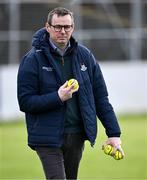 27 April 2024; Dublin GAA chief executive officer Finbarr O'Mahony gathers sliotars on the pitch during the warm-up before the Leinster GAA Hurling Senior Championship Round 2 match between Carlow and Dublin at Netwatch Cullen Park in Carlow. Photo by Piaras Ó Mídheach/Sportsfile