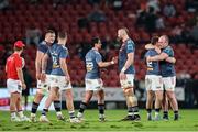 27 April 2024; Munster players celebrate beating the Emirates Lions 13-33 in the United Rugby Championship match between Emirates Lions and Munster at Emirates Airline Park in Johannesburg, South Africa. Photo by Shaun Roy/Sportsfile