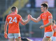 27 April 2024; Jarlath Óg Burns, right, adn Aidan Nugent of Armagh celebrate after the Ulster GAA Football Senior Championship semi-final match between Down and Armagh at St Tiernach's Park in Clones, Monaghan. Photo by Stephen McCarthy/Sportsfile
