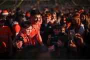27 April 2024; Rory Grugan of Armagh poses with supporters after the Ulster GAA Football Senior Championship semi-final match between Down and Armagh at St Tiernach's Park in Clones, Monaghan. Photo by Stephen McCarthy/Sportsfile