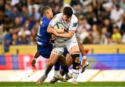 27 April 2024; Ben Brownlee of Leinster is tackled by Manie Libbok and Ben Loader of DHL Stormers during the United Rugby Championship match between DHL Stormers and Leinster at the DHL Stadium in Cape Town, South Africa. Photo by Harry Murphy/Sportsfile