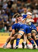 27 April 2024; Gus McCarthy of Leinster is tackled by Marcel Theunissen and Ruben van Heerden of DHL Stormers during the United Rugby Championship match between DHL Stormers and Leinster at the DHL Stadium in Cape Town, South Africa. Photo by Harry Murphy/Sportsfile