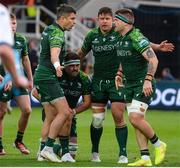27 April 2024; Shamus Hurley-Langton of Connacht, left, celebrates scoring a try with team-mates during the United Rugby Championship match between Dragons and Connacht at Rodney Parade in Newport, Wales. Photo by Kian Abdullah/Sportsfile