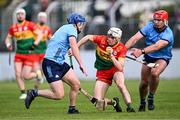 27 April 2024; Conor Kehoe of Carlow in action against John Bellew, left, and Paddy Smyth of Dublin during the Leinster GAA Hurling Senior Championship Round 2 match between Carlow and Dublin at Netwatch Cullen Park in Carlow. Photo by Piaras Ó Mídheach/Sportsfile