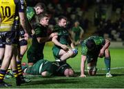 27 April 2024; Dylan Tierney-Martin of Connacht, centre, celebrates getting over the line to score a try during the United Rugby Championship match between Dragons and Connacht at Rodney Parade in Newport, Wales. Photo by Chris Fairweather/Sportsfile