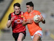 27 April 2024; Stefan Campbell of Armagh in action against Odhran Murdock of Down during the Ulster GAA Football Senior Championship semi-final match between Down and Armagh at St Tiernach's Park in Clones, Monaghan. Photo by Stephen McCarthy/Sportsfile