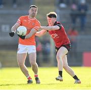 27 April 2024; Aidan Forker of Armagh and Miceal Rooney of Down during the Ulster GAA Football Senior Championship semi-final match between Down and Armagh at St Tiernach's Park in Clones, Monaghan. Photo by Stephen McCarthy/Sportsfile